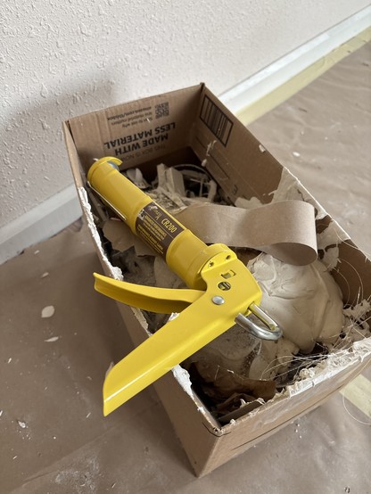 Well I'm only 2 feet in and my caulk gun has dropped the tube 3 times. This is a brand new fancy "construction grade" dripless caulk gun and its new home is this trash box.  
Yes, I know how to use caulk guns. Thanks for letting me vent.
#today #DIY