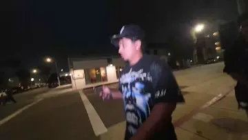 Cameraman tells car to stop