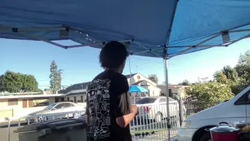 sharing food with the corn man