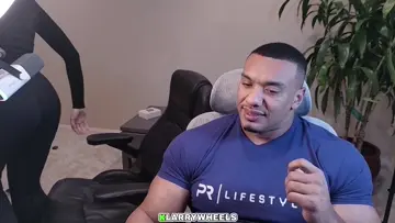 Larry smells his wifes seat