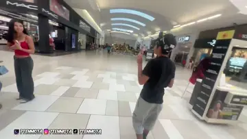 Mots gives prop money to girl