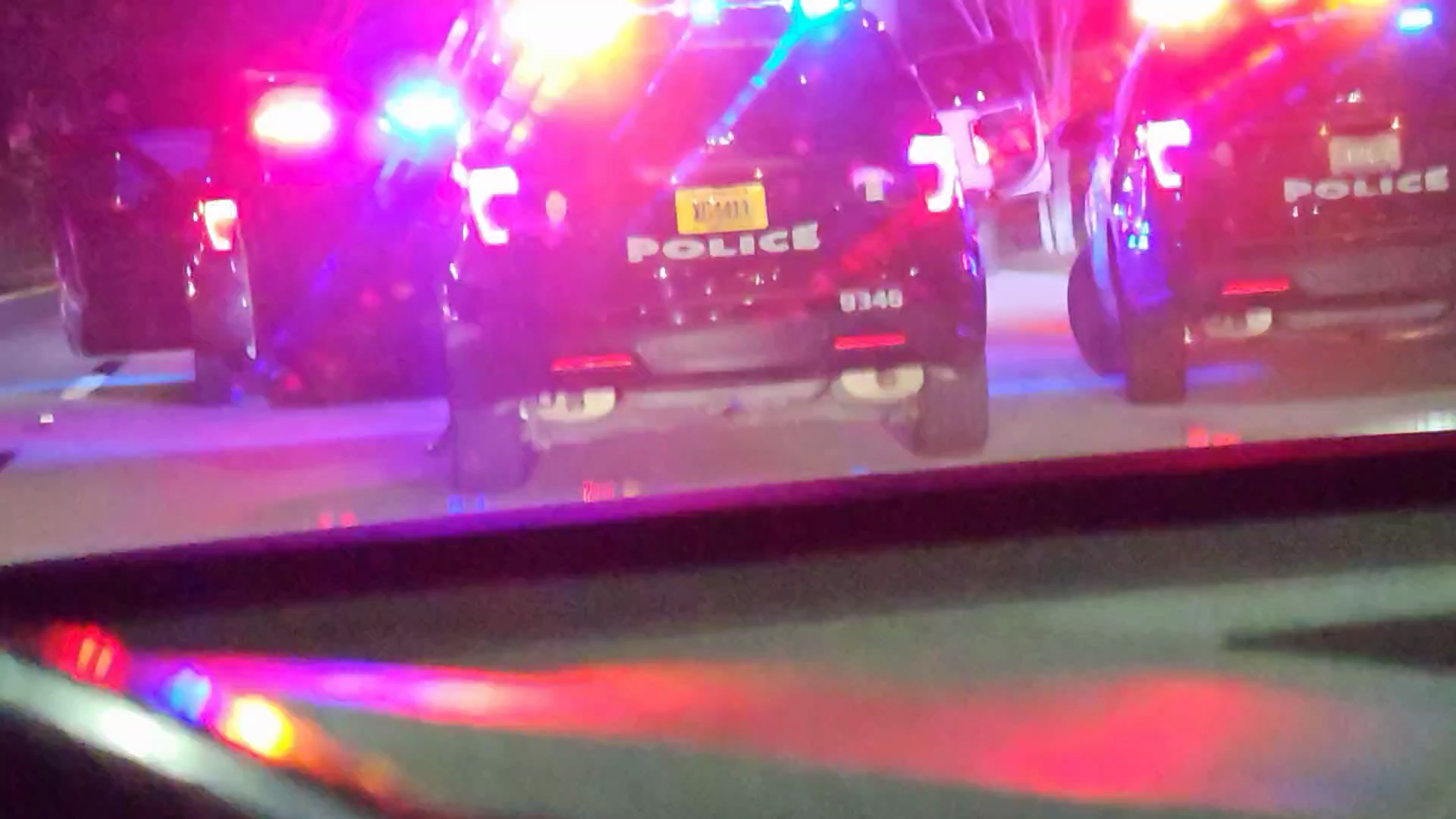 ANGRY COP AIMS HIS GUN AT INNOCENT PASSENGERS