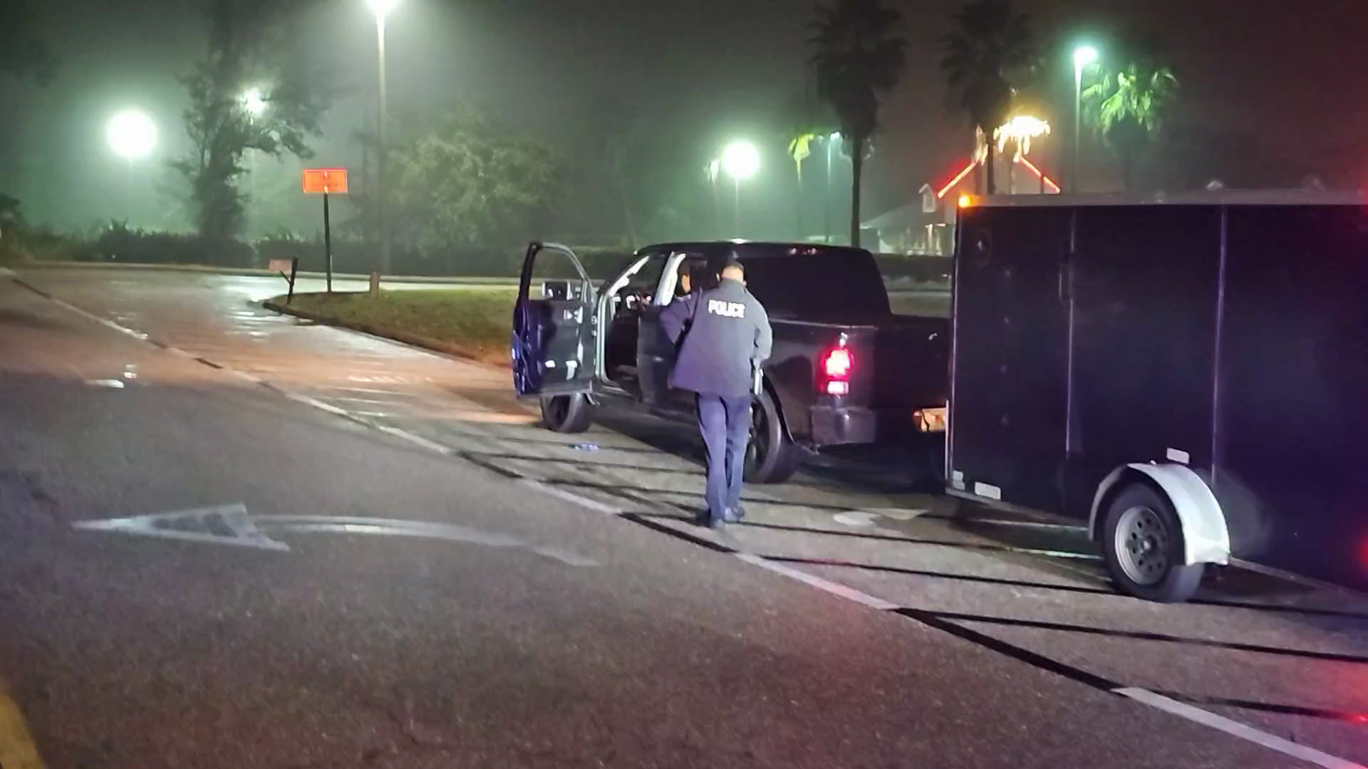 MAN TRIES TO KICK HIS WAY OUT OF BACK OF COP CAR