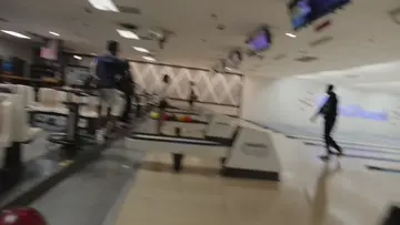 bowling with camera in my hand 