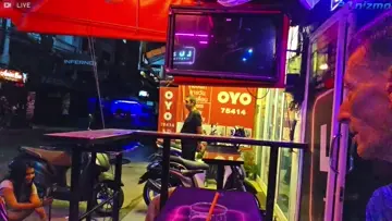 man films from hotel