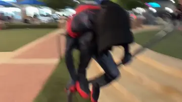 juan carries a baby 