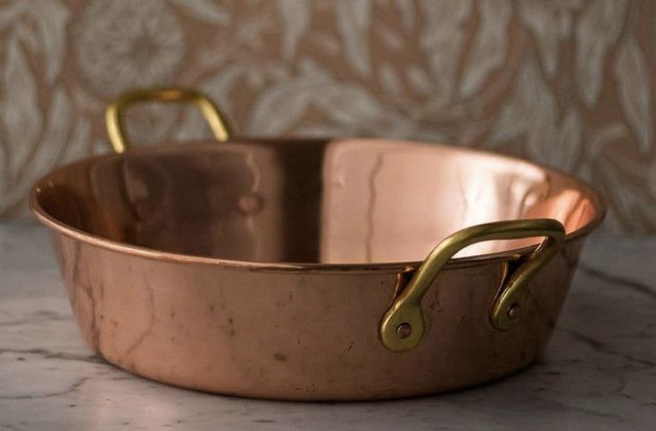 Copper Fait Tout or the "do everything pan". 11" diameter, 3