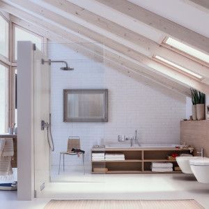 Spectacular, open bathroom with a slanted ceiling and an air