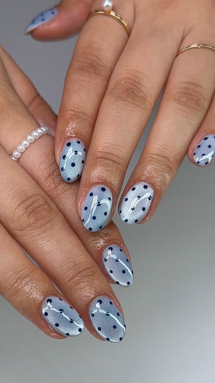 Shimmer meets playful patterns with Cat Eye Polka Dot Nails,