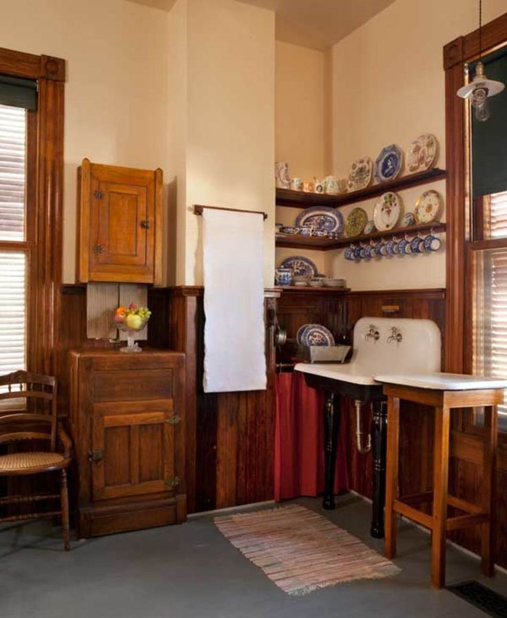 An old icebox adds some storage to a kitchen too old to have