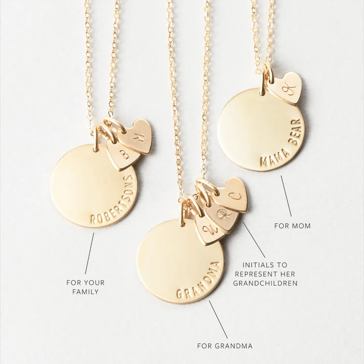 A bold personalized pendant with tiny initial heart tags. Th
