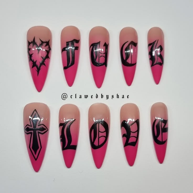 Made by ClawedByShae.
Hand-painted gothic lettering nails wi