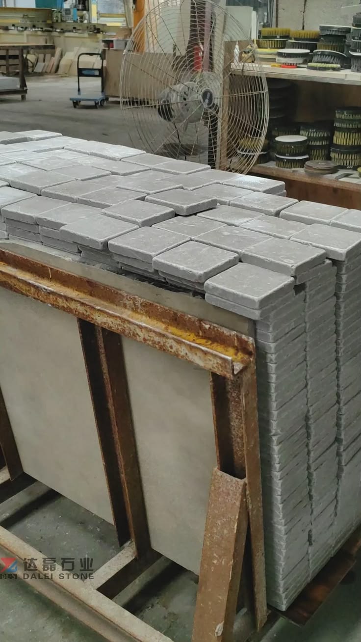 These tumbled grey stone pavers bring a soft, aged finish an