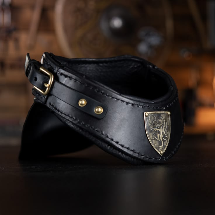 This Black Leather Gorget was made for King Ragnar of An Tir
