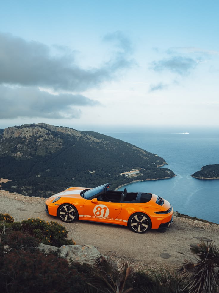 The perfect backdrop for a bold colour. The orange Porsche 9