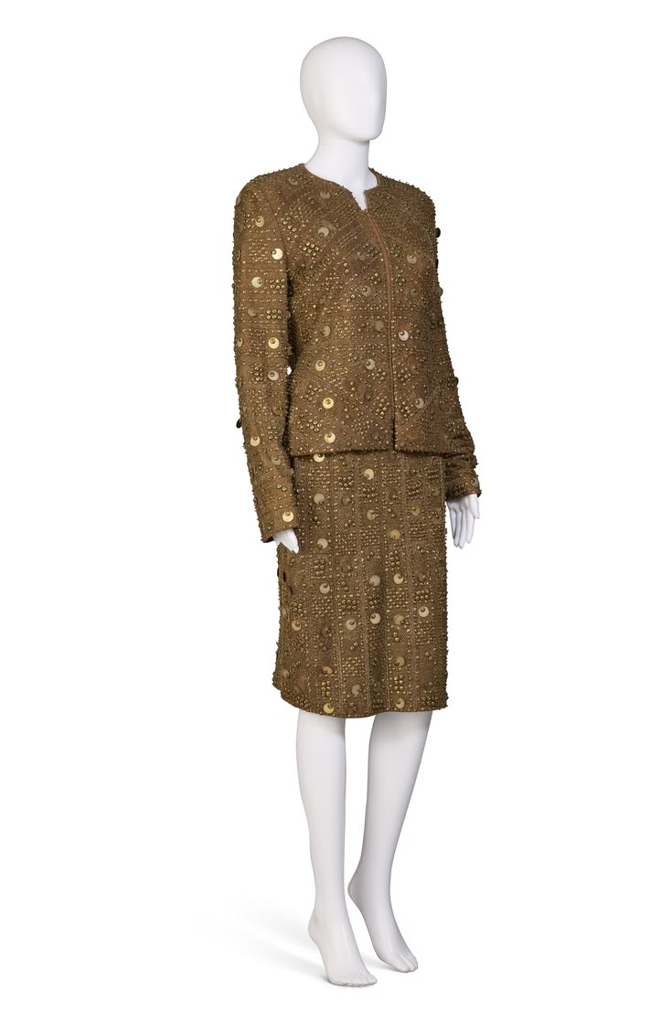 AN EMBELLISHED SUEDE SKIRT SUIT, AS SEEN ON MERYL STREEP AS 