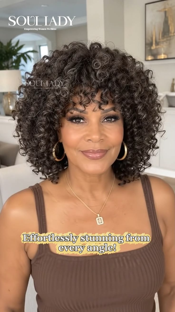 What does a dark brown mixed gray short curly bob with bangs