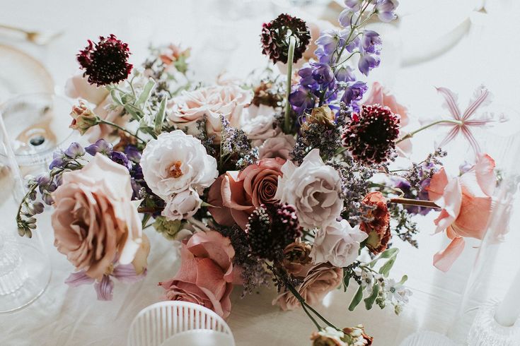 Wedding Reception Inspo: low centerpieces with garden stylin