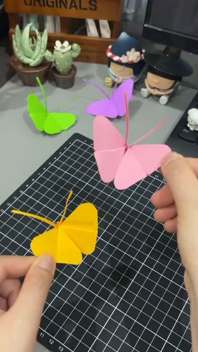 Learn how to make these colorful origami butterflies! 🦋✨  Cr
