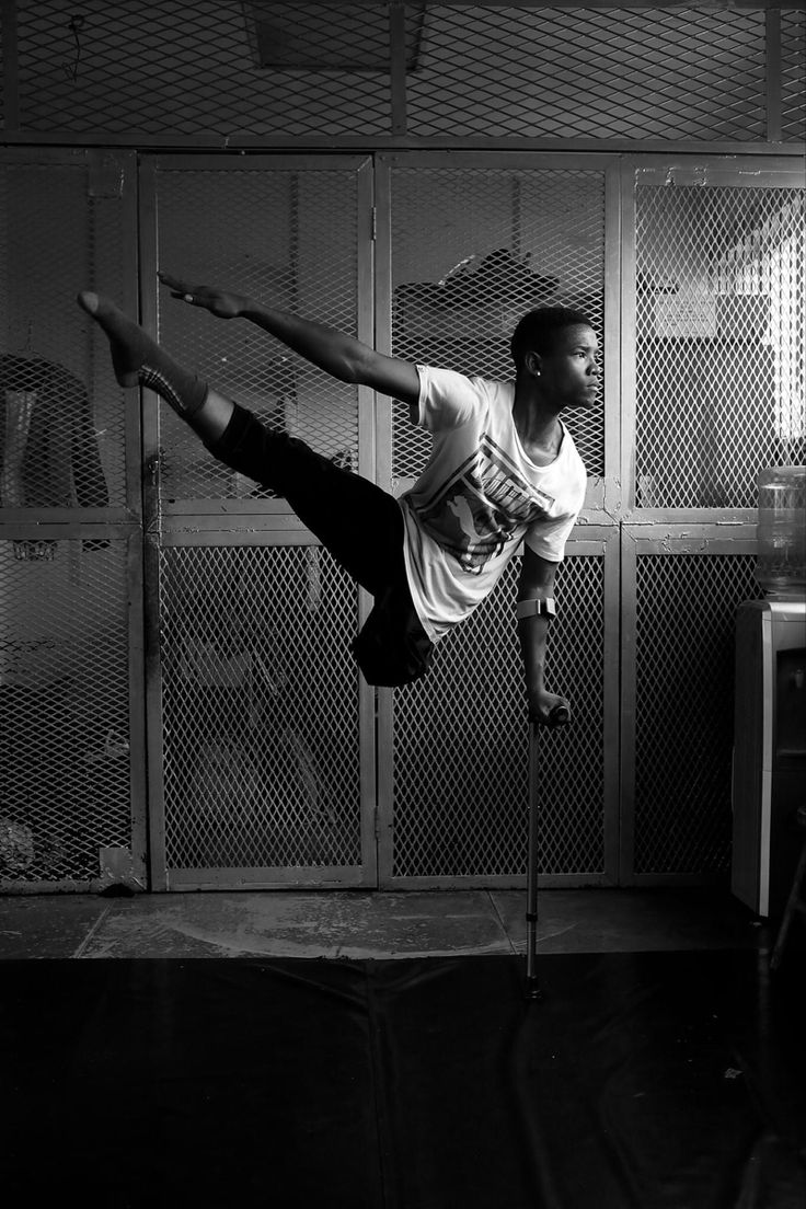 Professional dancer Musa Motha, who dances on crutches, pose