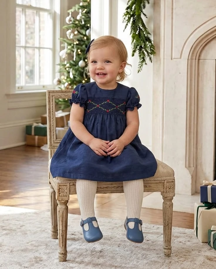 This Floral Smocked Silk Short Sleeve Baby & Toddler Girl Dr