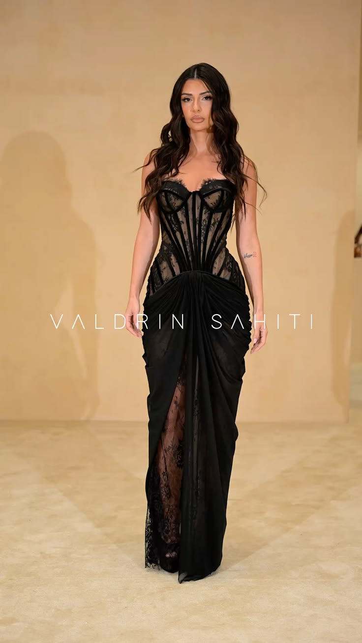 A study in modern couture. This black lace gown by Valdrin S