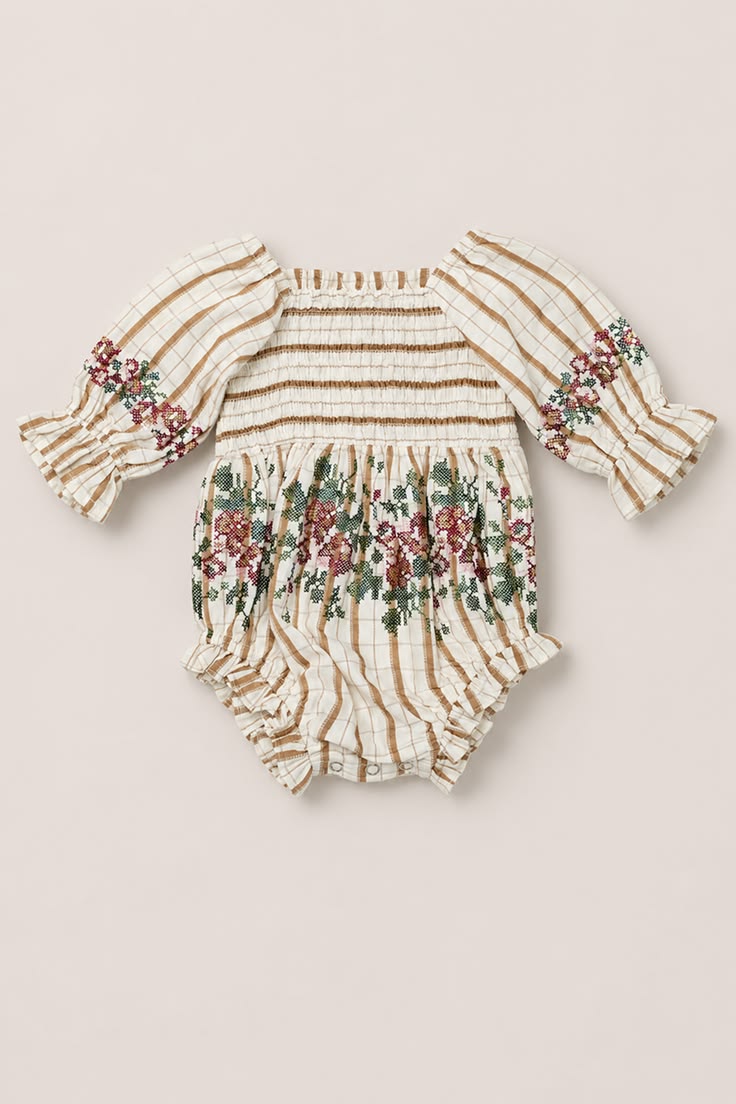 Sweater weather has arrived, and the Baby Madeline Romper fi