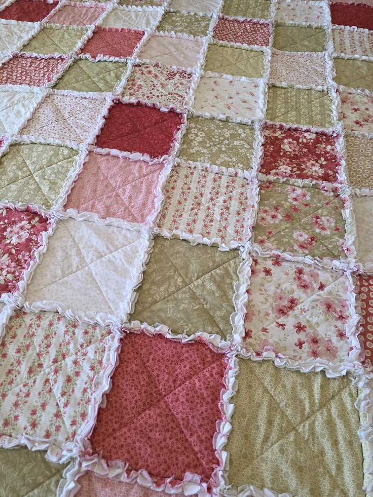 The Elizabeth large rag quilt throw is a sweet and elegant c