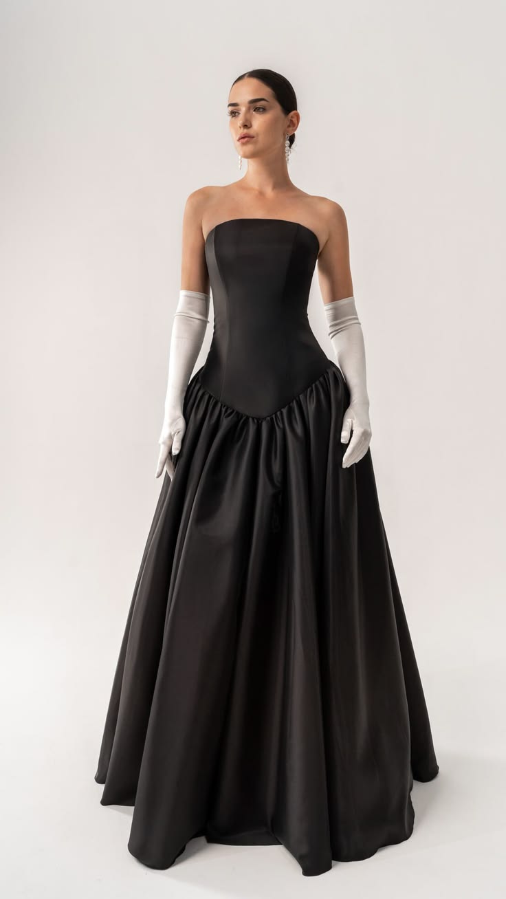 Say hello to our strapless black satin wedding dress, featur