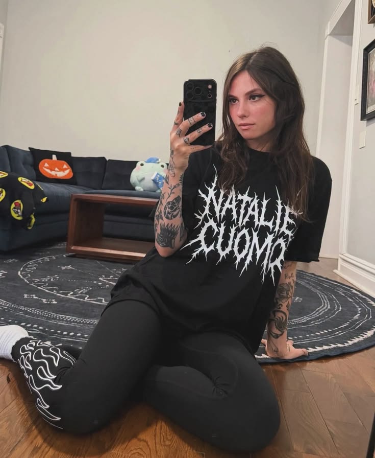 Natalie Cuomo pimping out some of her T-shirt merchandise.  