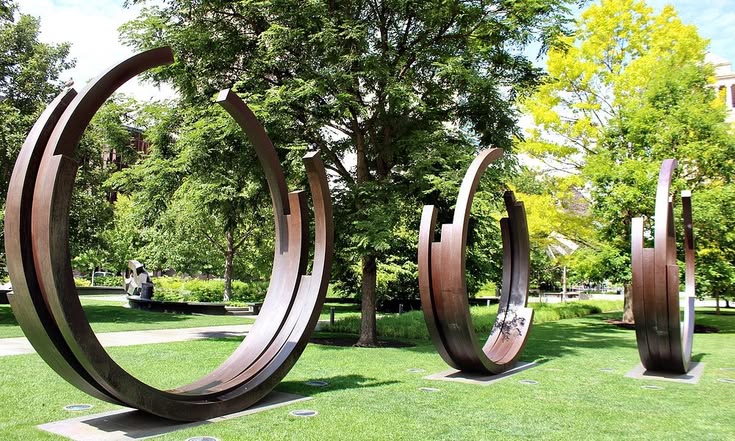 Bernar Venet’s 2 Arcs x 4 and 230.5 Degree Arc x 5. These ar
