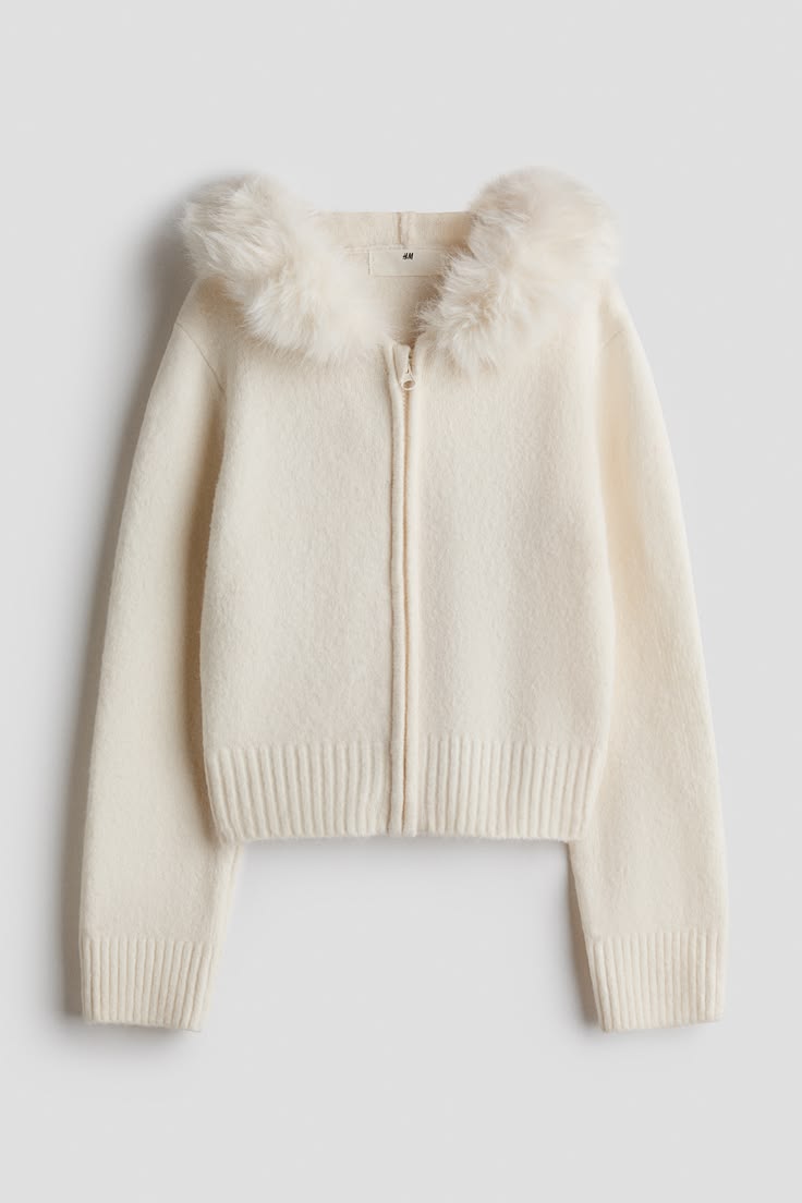 Cardigan in a soft knit with a gently brushed finish. Hood w