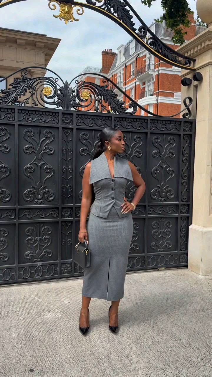 Step into effortless elegance with this chic grey fitted mid