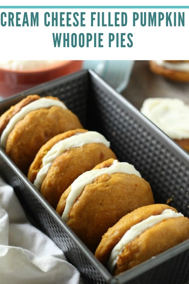 Thick, soft pumpkin cookies filled with tangy cream cheese f