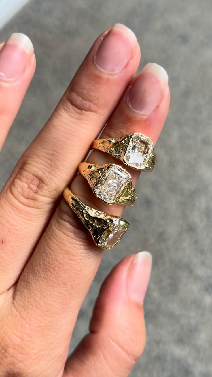 Diamonds set in 18ct gold in an organic style setting. Ninet