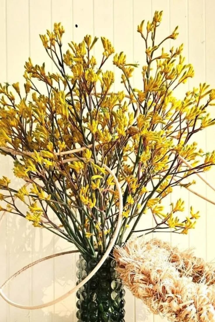 Twenty stems, two colors, a few bits of Cyperus. That was th