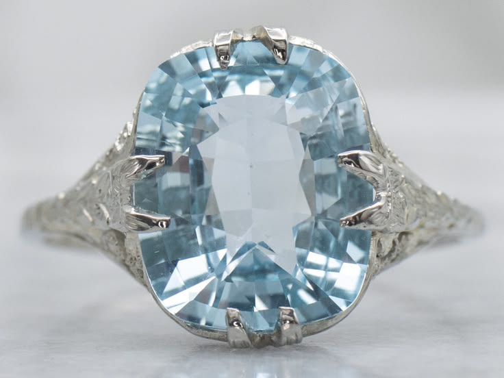 A stunning Art Deco blue topaz solitaire ring that captures 