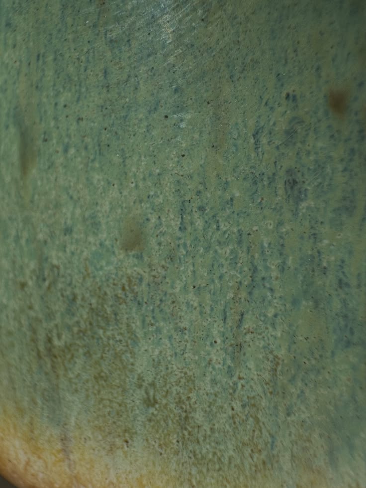 Each handmade mug develops unique glaze variation in the kil