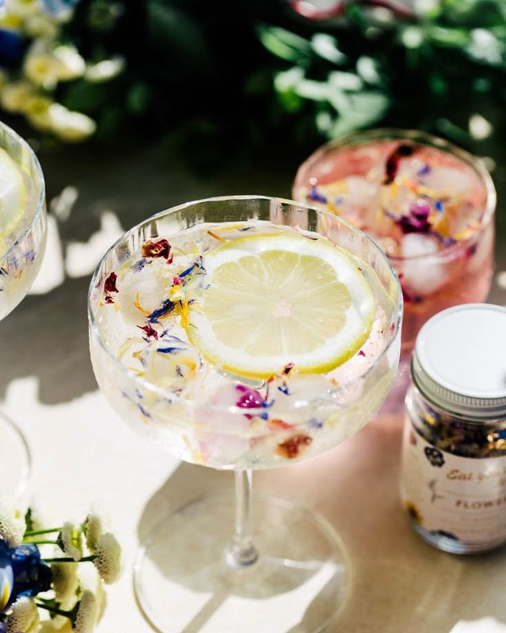 Sip into summer with a refreshing floral cocktail! Perfect f
