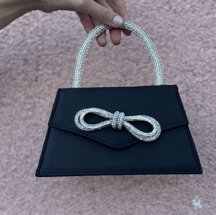 ✨ Meet the handbag that redefines holiday elegance. Introduc