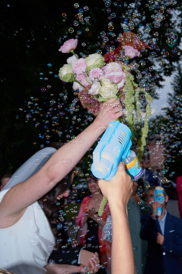 Floral wedding bouquet sourrounded by soap bubbles