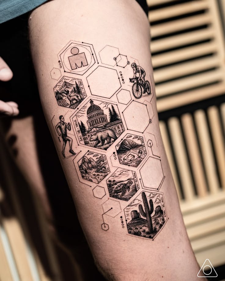 Fine-line geometric Ironman race tattoo on thigh by tattoo a