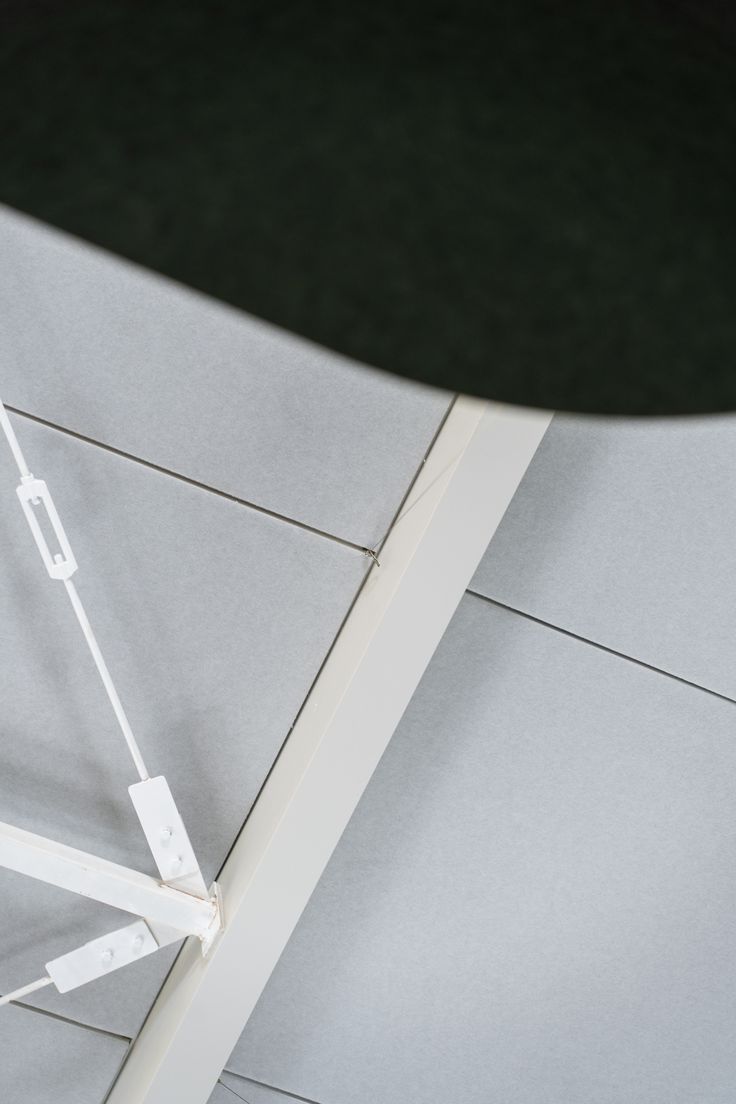 A discrete, high-performance broadband acoustic panel treatm
