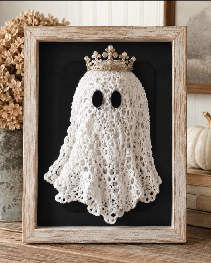 Turn a vintage crochet doily into the sweetest framed ghost 