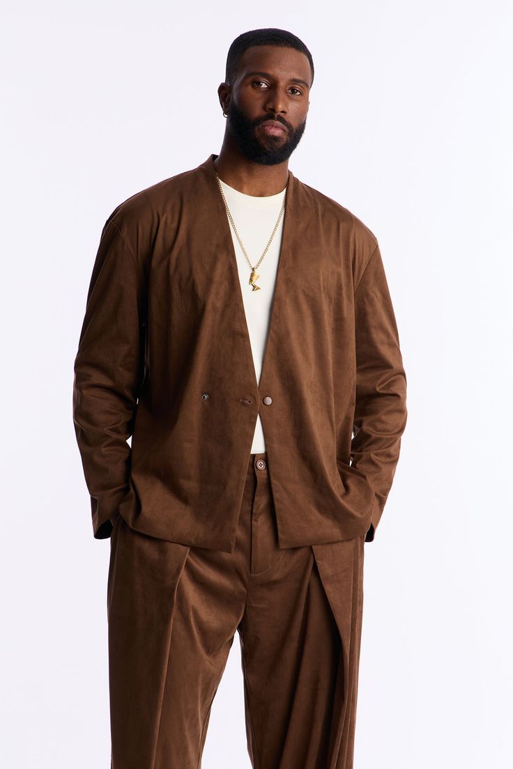 Available In Brown. Relaxed FitLong SleeveSuede TextureFront