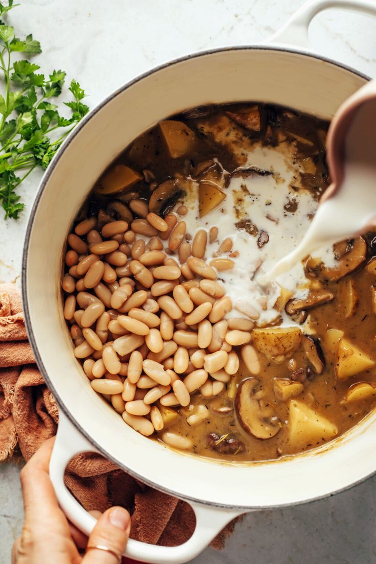 Cozy, creamy white bean and mushroom stew with potatoes and 