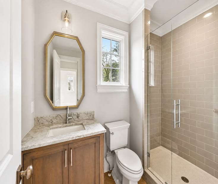 Cora Champagne and Gold Mirror is a refined decorative accen