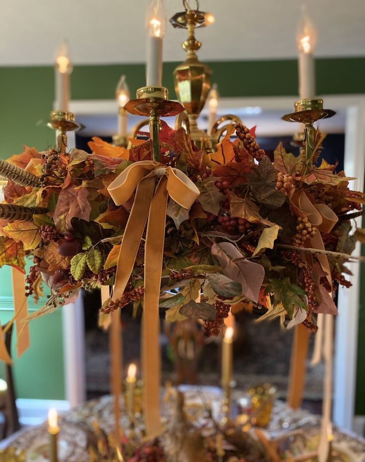 Fall leaves and velvet ribbon makes an elegant light chandel