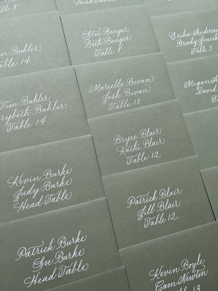 Midgreen envelopes with white ink calligraphy to serve as a 