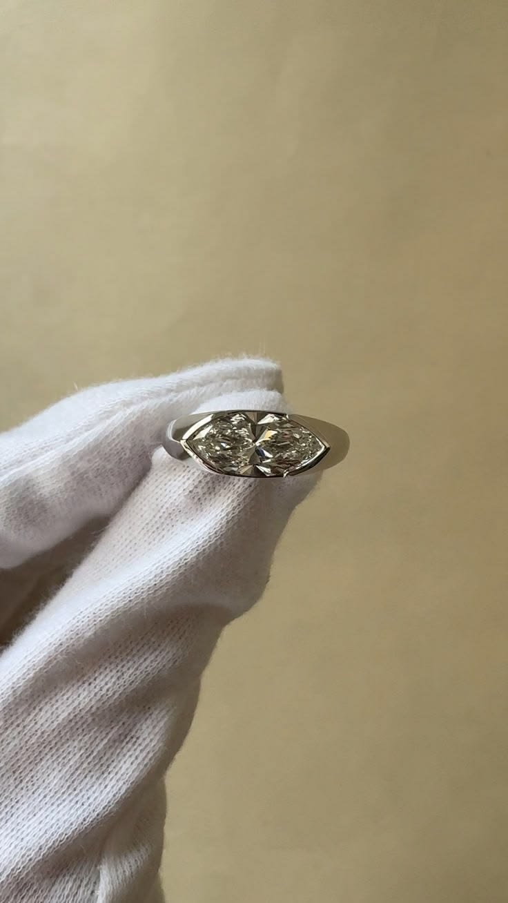 A unique marquise engagement ring with bold proportions. The